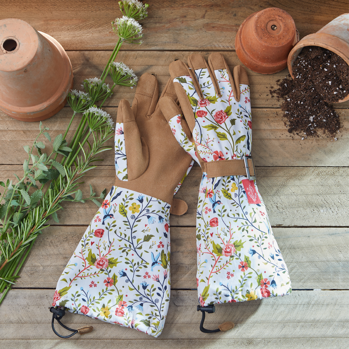 Barking Gardener Arm Saver Gloves with floral print, extra-long cuffs, and durable synthetic leather palms.