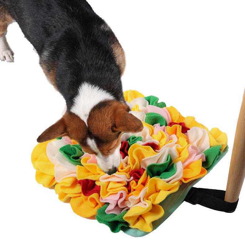 Barking Gardener multi-colored felt snuffle mat with a dog foraging for treats on a non-slip base
