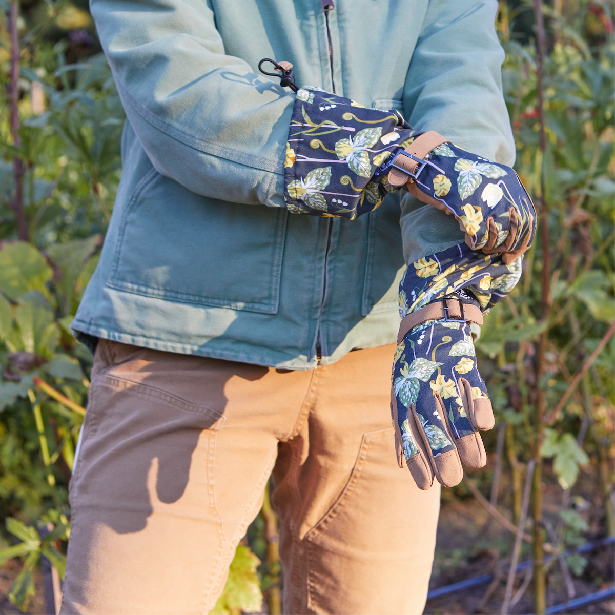 Barking Gardener Arm Saver Gloves with floral print, extra-long cuffs, and durable synthetic leather palms.